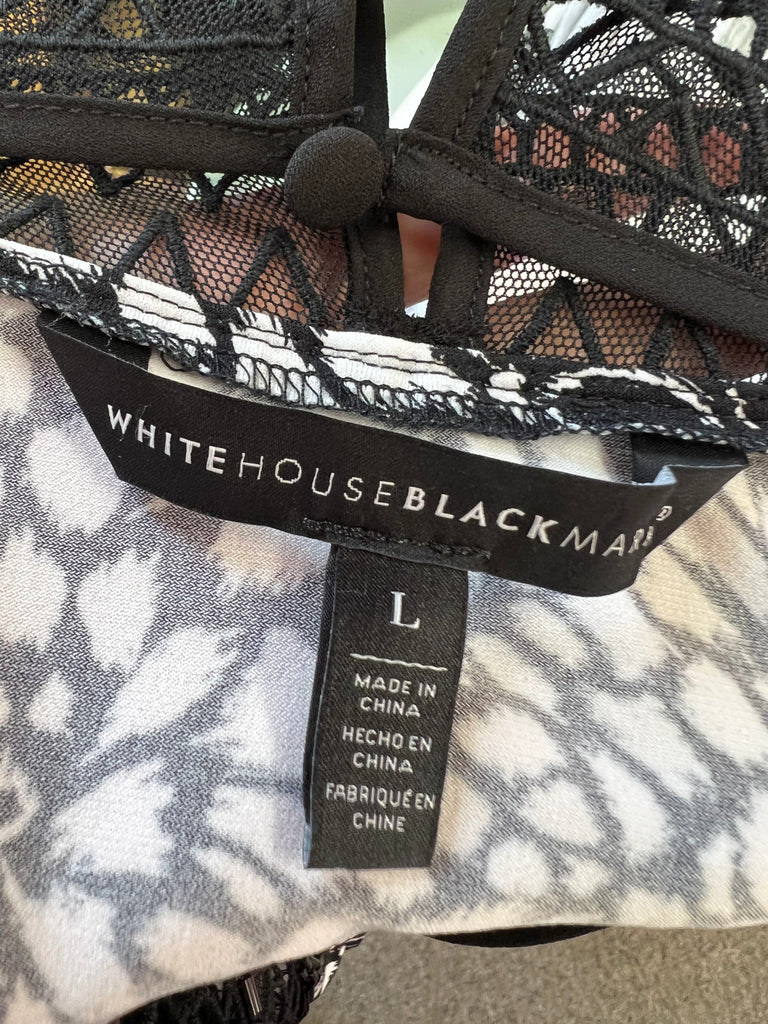 White House Black Market Sleeveless blouse sz Large