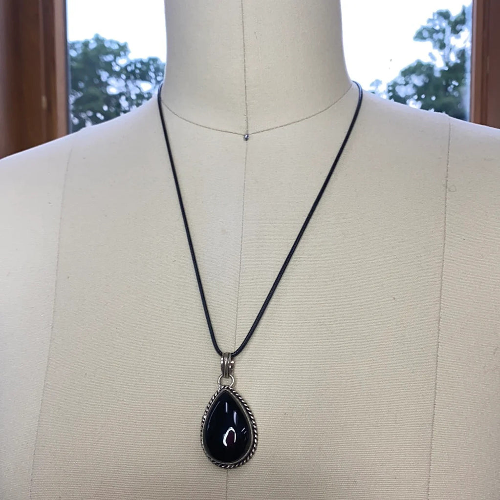 Sterling  and Obsidian pendant necklace with leather cord.