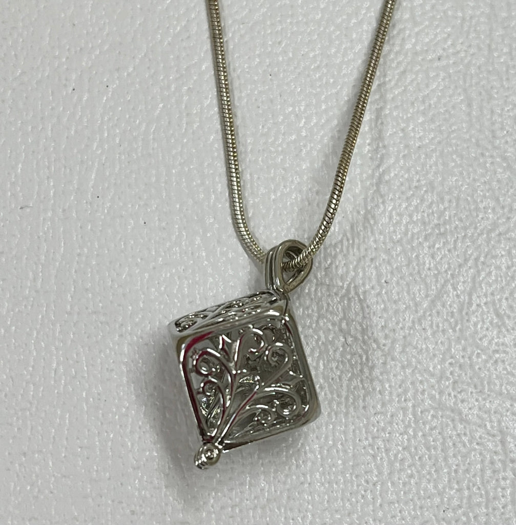 Laser cut metal cube pendant necklace