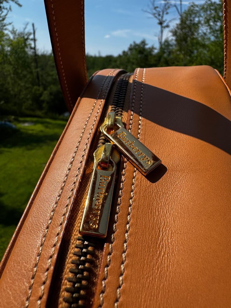 Burberry leather train case top handle bag